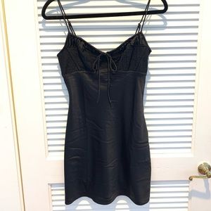 Black mini slip dress with lace detailing